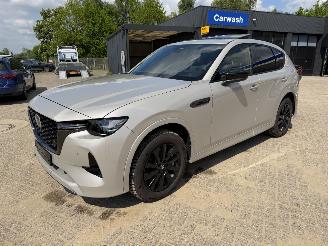 Schadeauto Mazda CX-60 2.5 PHEV  Homura AWD 2025/12