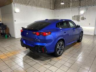 Unfallwagen BMW iX2 eDrive20 M Sport Pro AHK/KAM/NAVI 2025/2