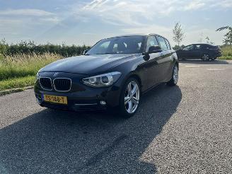 skadebil auto BMW 1-serie 114i EDE High Executive 2014/5