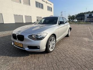 Damaged car BMW 1-serie 116I EDE BUSINESS+ SCHUIFDAK 2013/8