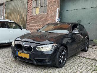 Schadeauto BMW 1-serie 118i Executive automaat KM NAP 2018/2