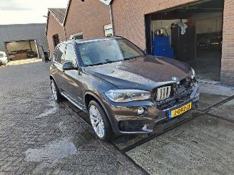 skadebil auto BMW X5 2.0 hybride   x drive  pano   255kw 2015/11