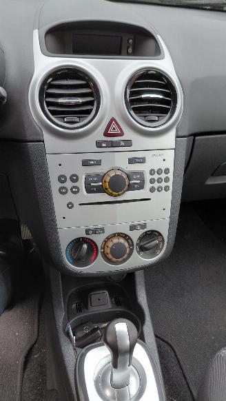 uszkodzony samochody osobowe Opel Corsa 1.2i automaat   5drs airco 2011/5