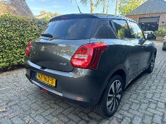 Vaurioauto  passenger cars Suzuki Swift 1.2 STIJL SMART HYBRID NAVI CAMERA CRUISE STOELVERWARMING 2017/5