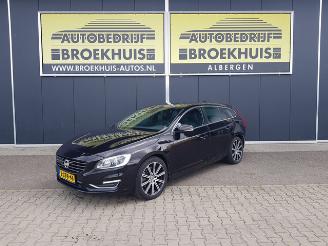 damaged passenger cars Volvo V-60 2.4 D6 AWD Plug-In Hybrid Pure Limited 2014/7