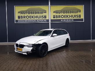 Damaged car BMW 3-serie Touring 316i 2013/9