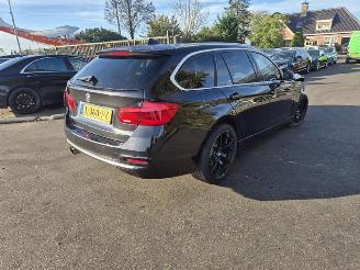 uszkodzony samochody osobowe BMW 3-serie 320i Touring 2018/4