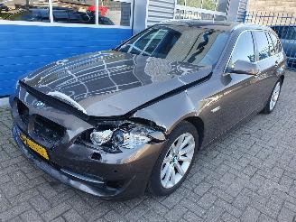 skadebil auto BMW 5-serie 520i automaat Upgrade Edition 2012/10