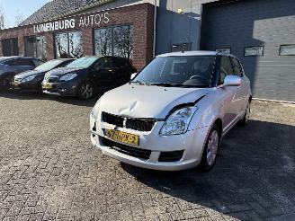 uszkodzony samochody osobowe Suzuki Swift 1.3 Comfort (Hatchback 5-dr.) 2009/2