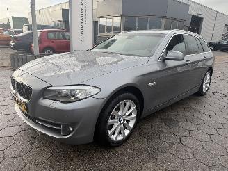 Damaged car BMW 5-serie Touring 520d High Executive 2011/12