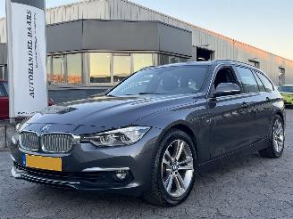 Vaurioauto  passenger cars BMW 3-serie Touring 320i Luxury Edition 2018/11