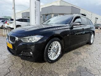 Vaurioauto  passenger cars BMW 3-serie Touring 320i Upgrade Edition 2014/2
