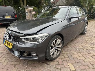 skadebil auto BMW 1-serie 118i Executive 2017/12