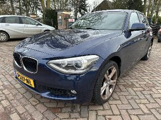 damaged passenger cars BMW 1-serie 114d High Executive 2013/5