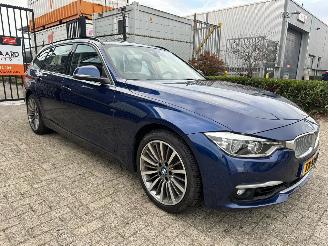 skadebil auto BMW 3-serie 318i Luxury Edition 2018/11