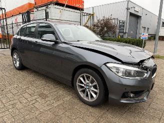 Unfallwagen BMW 1-serie 118i High Executive Automaat 2019/1