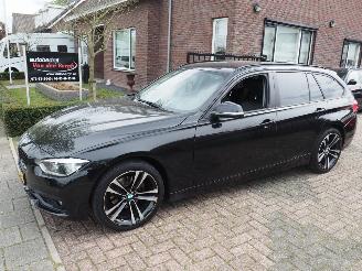 Damaged car BMW 3-serie 320i Coprate Lease Executive Automaat 2018/2