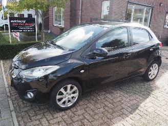 Vaurioauto  passenger cars Mazda 2 1.3 XS 2013/2