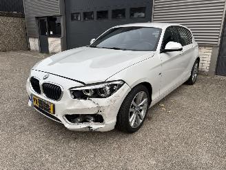 damaged passenger cars BMW 1-serie 118i SPORT / AUTOMAAT / LEER / NAVI / CRUISE / PDC 2017/10
