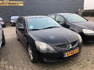 damaged passenger cars Mitsubishi Lancer  2004/3