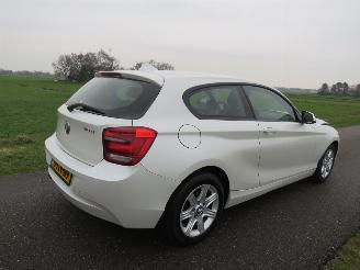 damaged passenger cars BMW 1-serie 118 Diesel 143pk 6 Bak Navigatie Airco 2014  [ Model 2015  [parelmoer 2014/5