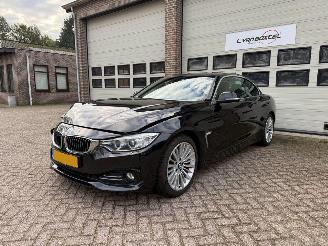krockskadad bil auto BMW 4-serie 420i Cabrio High Executive Automaat Navi Memory 2014/11