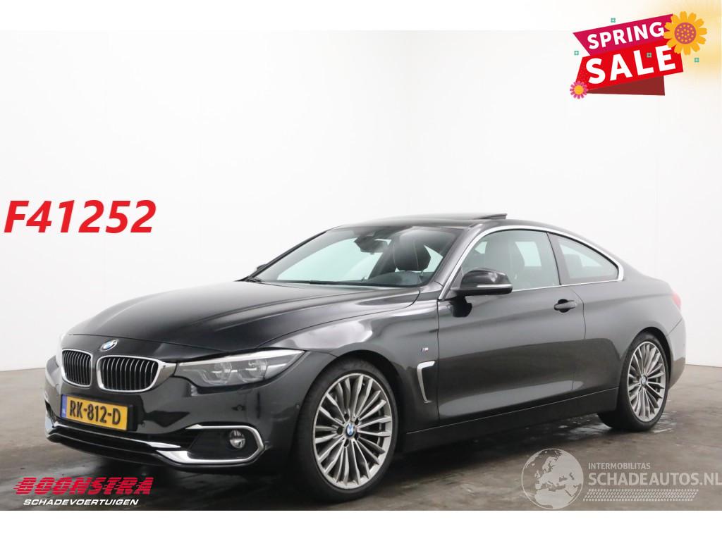 BMW 4-serie Coupé 440i M-Sport Schuifdak LED Leder H/K Memory HUD Camera AHK