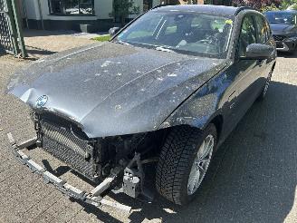 Vaurioauto  passenger cars BMW 3-serie 320e Touring xDrive Business Automaat 2021/11