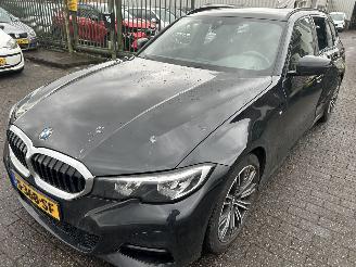 skadebil auto BMW 3-serie 320i Stationcar Automaat  M Pakket 2022/1