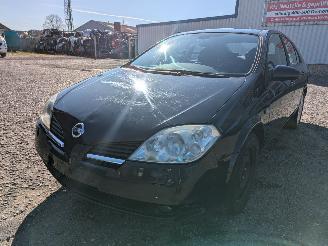 Coche siniestrado Nissan Primera 2.0 2004/9
