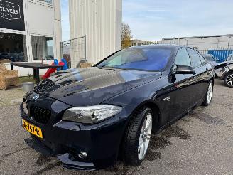 damaged passenger cars BMW 5-serie 520i High Executive AUTOMAAT 2015/6