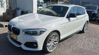 skadebil auto BMW 1-serie 120i  AUTOMAAT Centennial High Executive 2017/2
