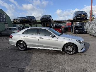 Vaurioauto  passenger cars Mercedes E-klasse 220 Bluetec 125KW Automaat AMG Edition Clima Navi Led Xenon NAP 2015/12