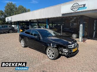 Vaurioauto  passenger cars Mercedes C-klasse 180 Coupe Facelift Navi H&K Clima Stoelverw. 2011/7