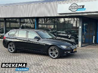 Schadeauto BMW 3-serie 316i High Executive Navigatie Cruise PDC Automaat 2014/2