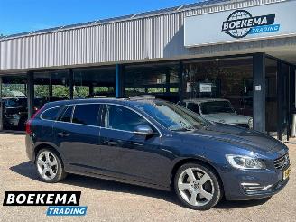 damaged passenger cars Volvo V-60 2.4 D6 AWD Plug-In Hybrid Summum Open dak Navi Xenon 2013/10