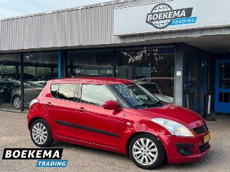 Schadeauto Suzuki Swift 1.2 Exclusive EASSS Keyless Climate PDC trek. 2012/5