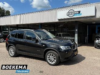 Schadeauto BMW X3 xDrive20i High Ex. Aut Panorama Head-Up Leer Navigatie 2012/10