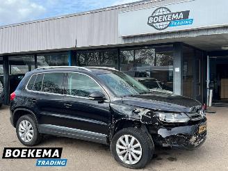 skadebil auto Volkswagen Tiguan 1.4 TSI R-Line DSG Dynaudio Stoelverwarming Climate Cruise 2014/1