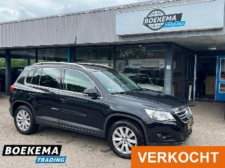 Schadeauto Volkswagen Tiguan 2.0 TSI Sport&Style 4Motion DSG Leer Stoelverwarming Navigatie 2010/11