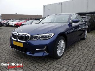 Damaged car BMW 3-serie 320i High Executive Edition 2019/7
