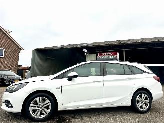 Opel Astra sports tourer 1.4 Turbo 145pk automaat - navi - nap - org NL - airco - cruise - pdc - licht + regensensor picture 1