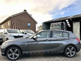 skadebil auto BMW 1-serie 118i 136pk 6-bak Cent Sport-Line 2017/2