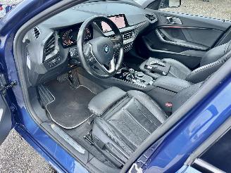 BMW 1-serie Gereserveerd 118i 136pk 7-Traps aut High Exe - nap - virtual - nav - cam - front + line + park assist - leer + stoelverw - sfeerverl picture 17