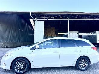 Auto incidentate Toyota Auris Touring Sports 1.8 Hybrid 123pk automaat - pano - nap - 2014/10