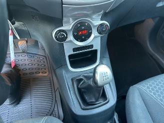Ford Fiesta 1.25i 82pk Titanium 5drs - 94dkm nap - airco - cruise - licht + regensensor + aut dimmend binnenspiegel - lmv picture 33