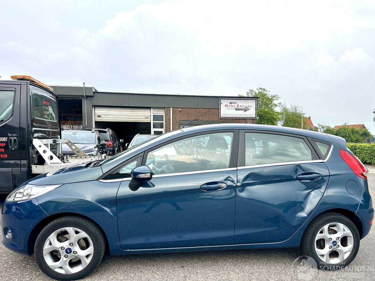 Ford Fiesta 1.25i 82pk Titanium 5drs - 94dkm nap - airco - cruise - licht + regensensor + aut dimmend binnenspiegel - lmv