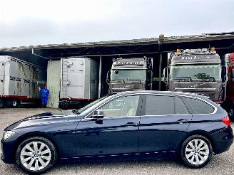 skadebil auto BMW 3-serie 320i 184pk 8-traps aut High Executive - nap - xenon - beige leer - stoelverw - navi - pdc - elektr klep 2014/1