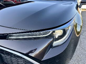 Toyota Corolla Touring Sports 2.0 Hybrid 184pk aut + f1 Executive - nap - pano - head up - keyless - front + line + side assist - kuipstoelen picture 7