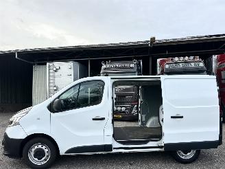 skadebil bedrijf Renault Trafic 2.0 dCi 145pk 6-traps automaat T29 L1H1 Comfort 3pers - nap - 1e eig - 2x schuifdeur - navi - airco - cruise - pdc 2021/4